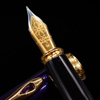  A macro shot of the nib with its intricate detailing and logo engraving for the Diplomat Excellence A2 Fountain Pen - Deep Purple.