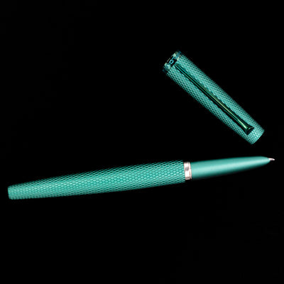 An overhead view of the Diplomat Viper Fountain Pen - Green uncapped. 
