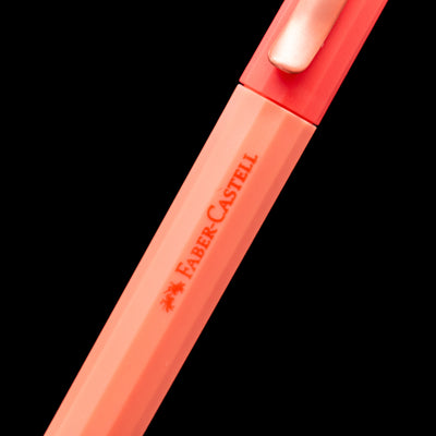 A zoomed-in view of the logo on the body of the Faber-Castell Avori Ballpoint Pen - Inner Fire.