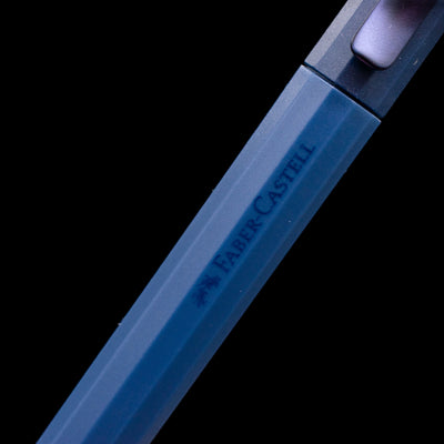 A zoomed-in view of the logo on the body of the Faber-Castell Avori Ballpoint Pen - Midnight Muse.