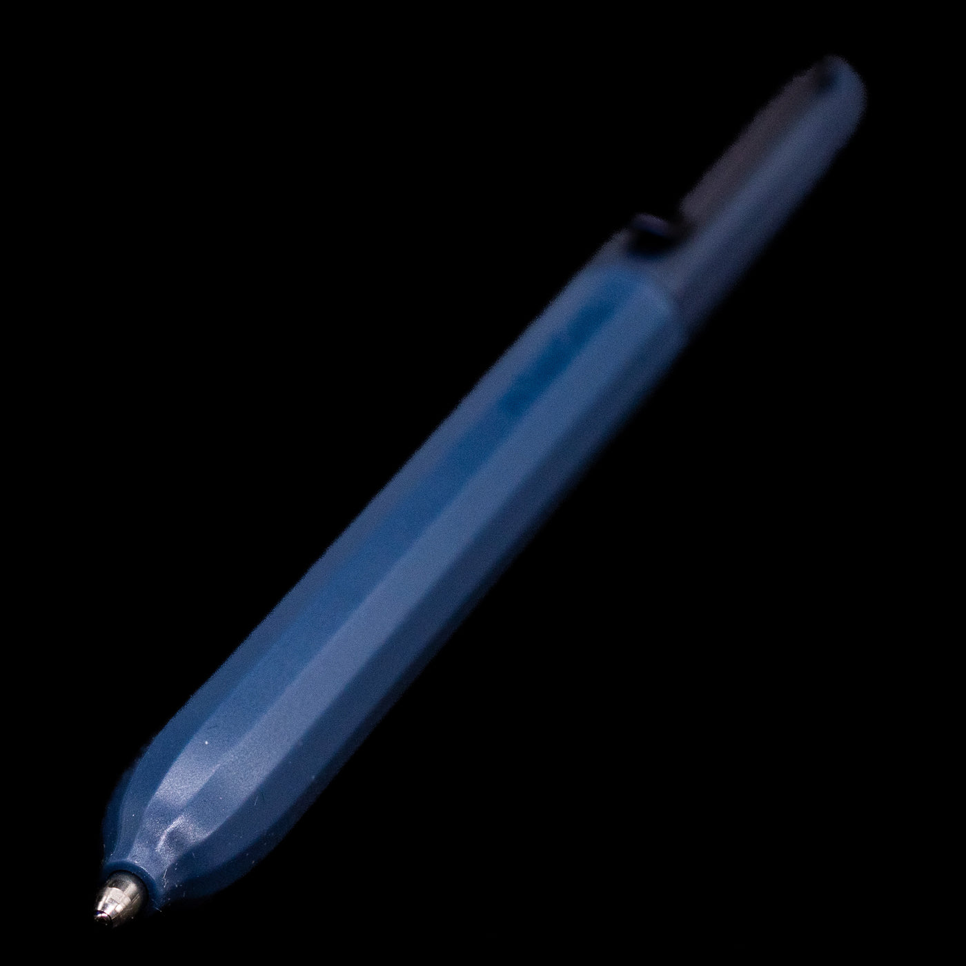 A full view of the Faber-Castell Avori Ballpoint Pen - Midnight Muse with a focus on the activated tip.
