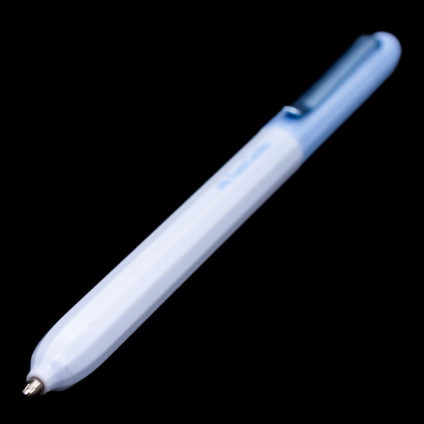 A full view of the Faber-Castell Avori Ballpoint Pen - Peace of Mind with a focus on the activated tip.