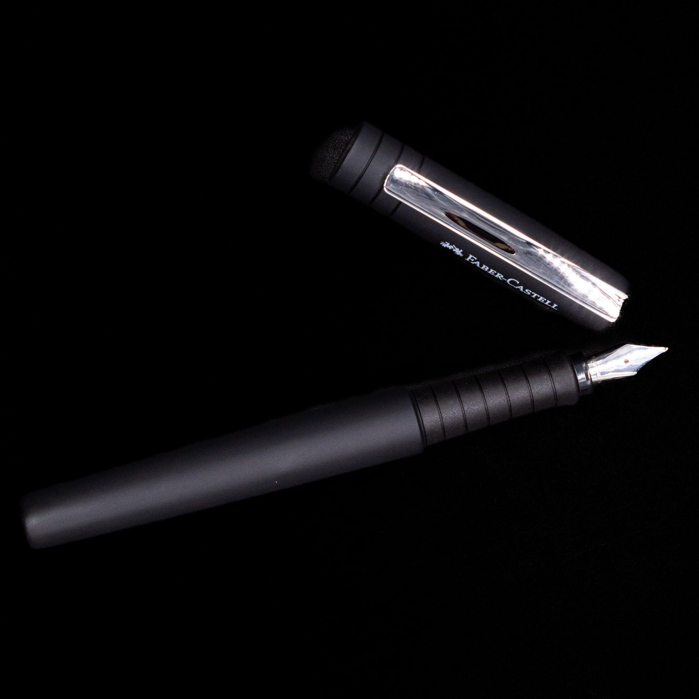 An overhead view of the Faber-Castell Poly Fountain Pen - Black uncapped.