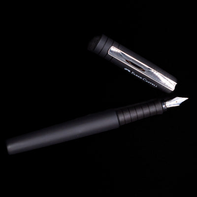 An overhead view of the Faber-Castell Poly Fountain Pen - Black uncapped.