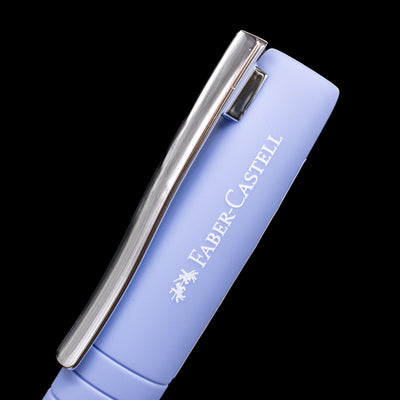 A close-up look at the logo on the side of the cap on the Faber-Castell Poly Fountain Pen - Caribic Blue.