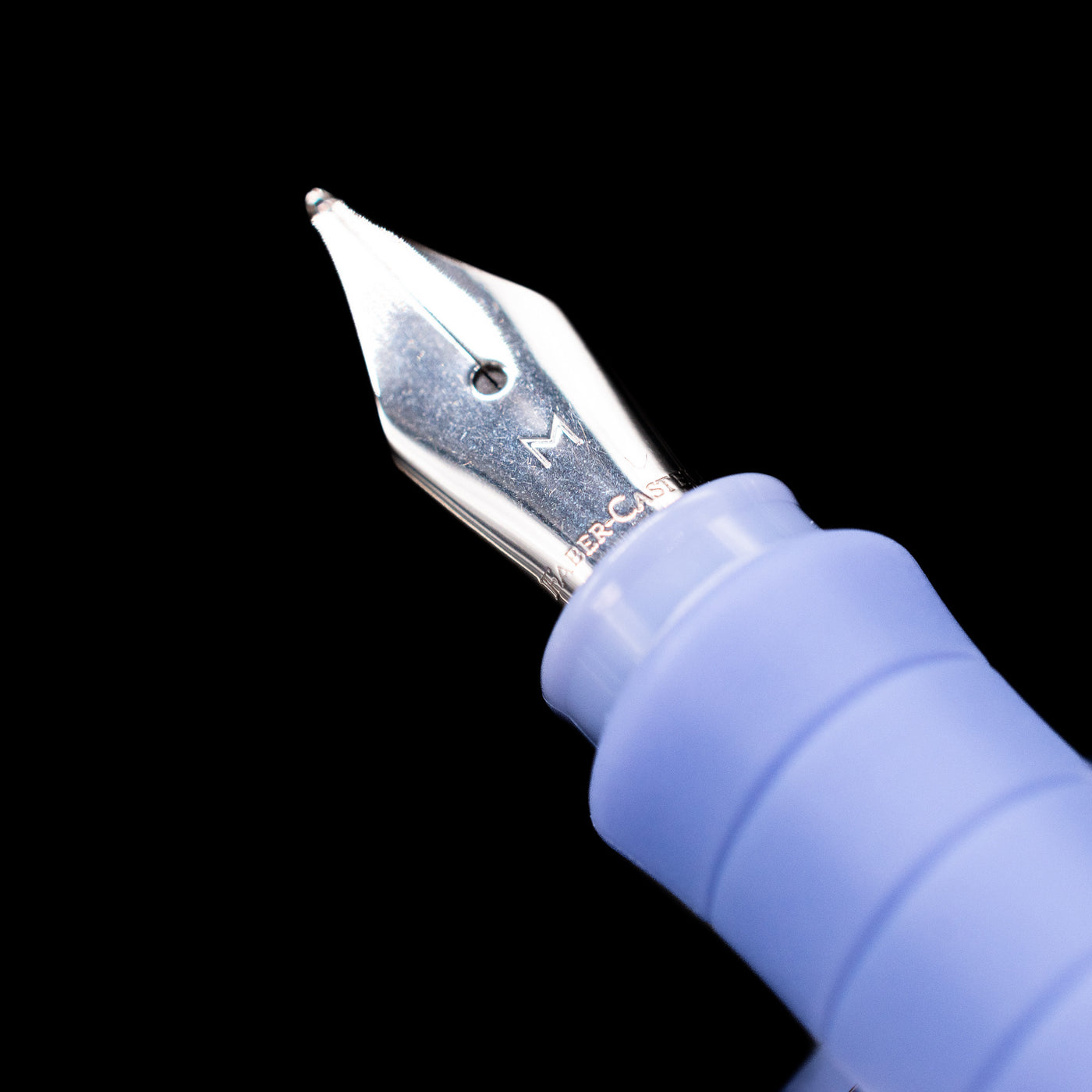 A macro shot of the nib with its intricate detailing and logo engraving for the Faber-Castell Poly Fountain Pen - Caribic Blue.