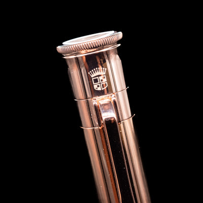 Zoomed view of the logo on the cap, with rose gold detailing on the Graf von Faber-Castell Classic Limited Edition fountain pen.