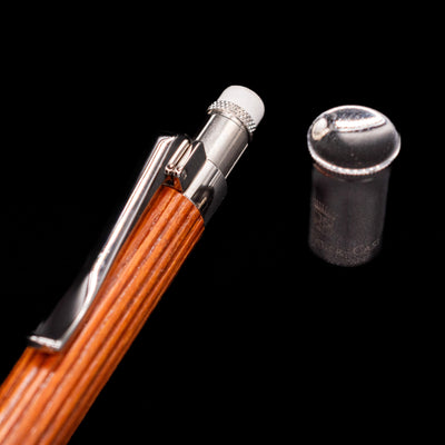 A close-up shot of the cap on the eraser of the Graf von Faber-Castell Classic Mechanical Pencil - Pernambuco Wood.