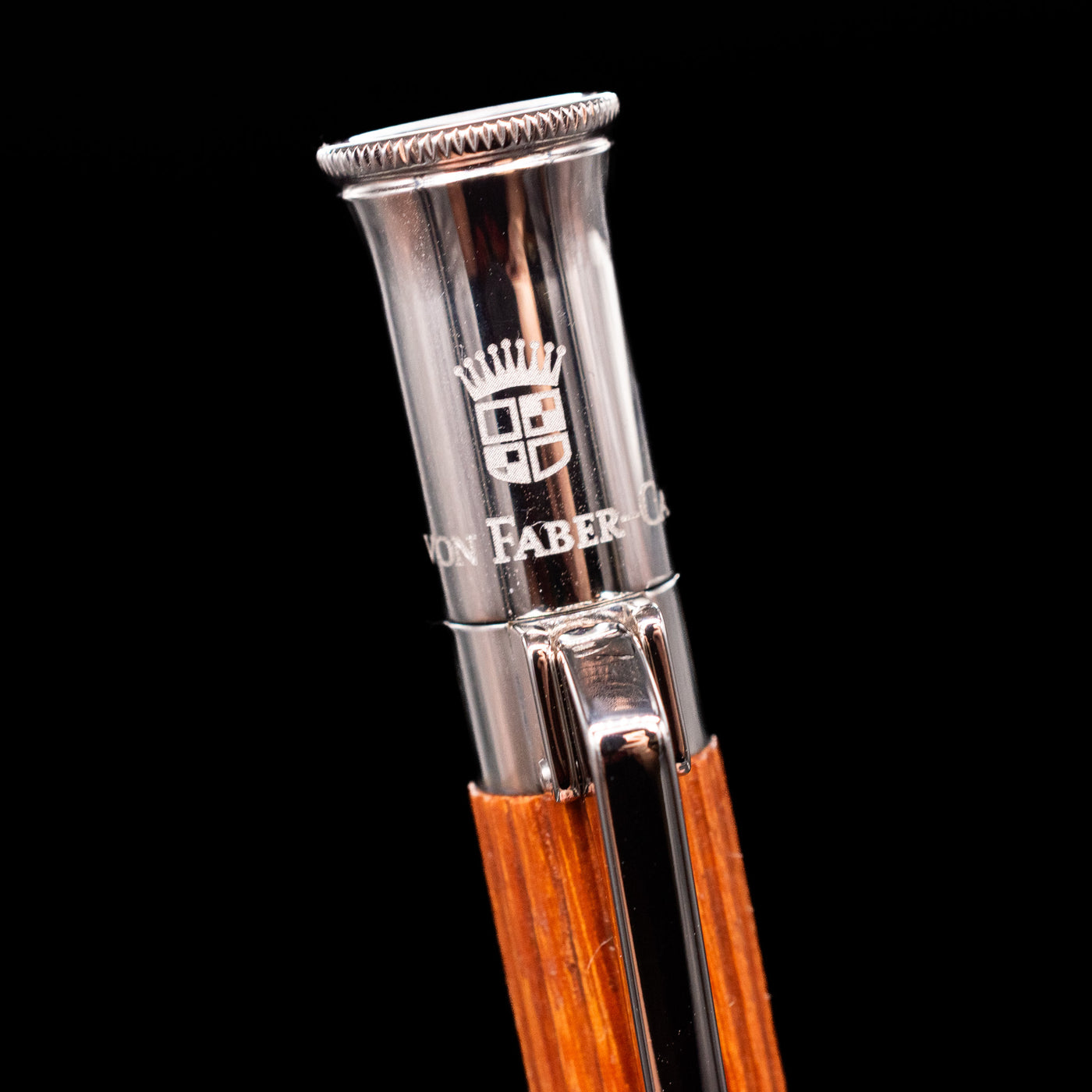 A macro shot of the logo on the cap for the Graf von Faber-Castell Classic Mechanical Pencil - Pernambuco Wood.