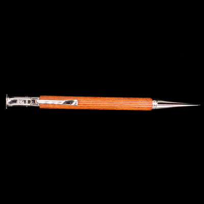 An overhead view of the Graf von Faber-Castell Classic Mechanical Pencil - Pernambuco Wood.