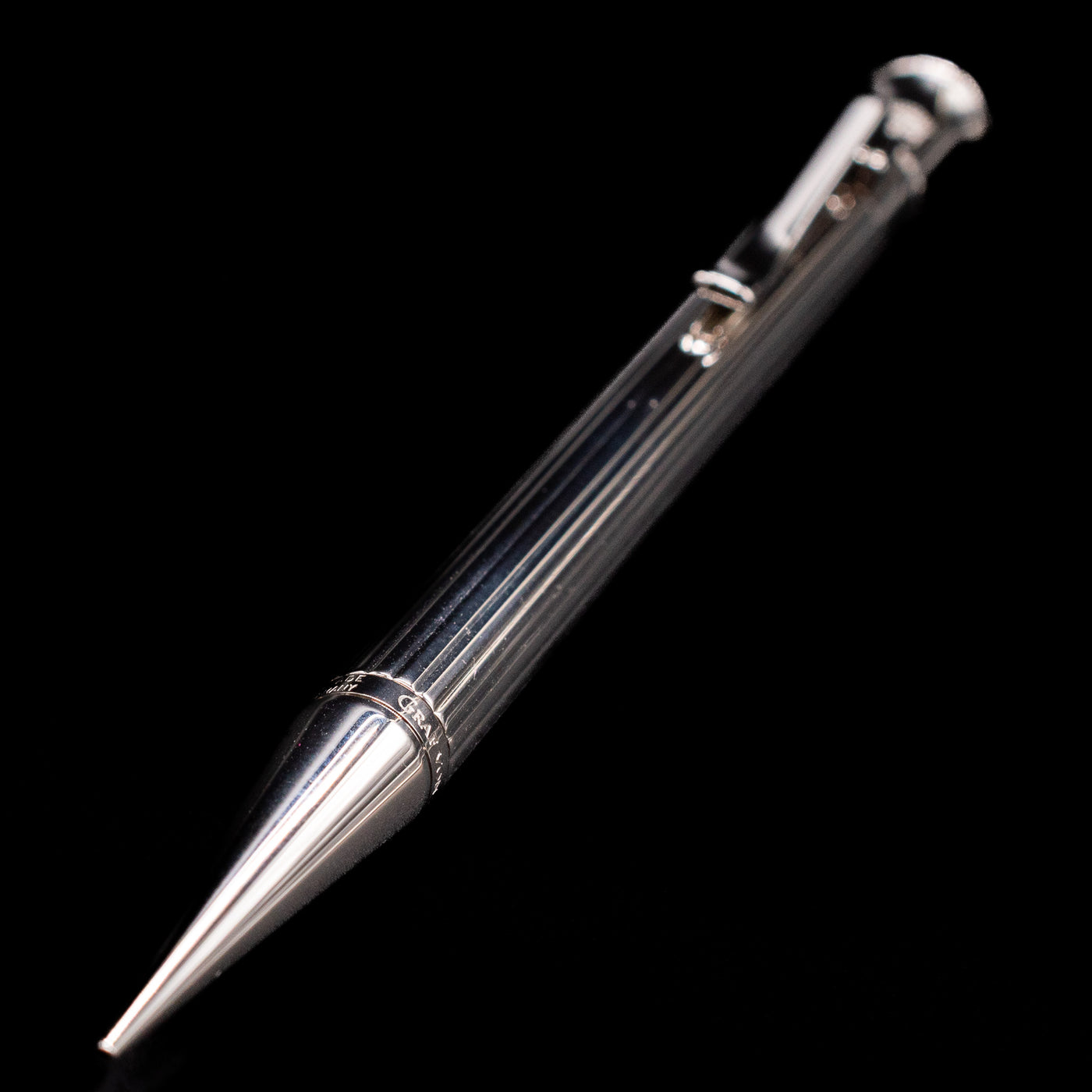 Full view of the Graf von Faber-Castell Classic Mechanical Pencil - Platinum Plated with a focus on the tip.