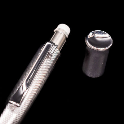 A close-up shot of the cap covering the eraser for the Graf von Faber-Castell Guilloche Mechanical Pencil - Barley Rhodium.