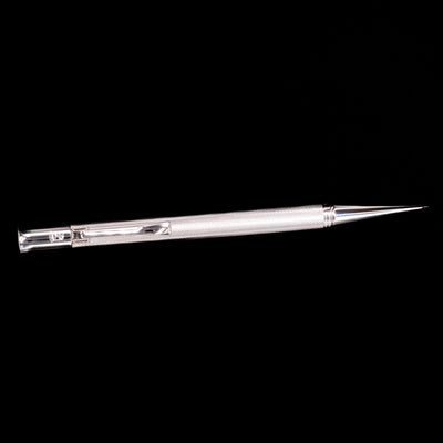 An overhead view of the Graf von Faber-Castell Guilloche Mechanical Pencil - Barley Rhodium.