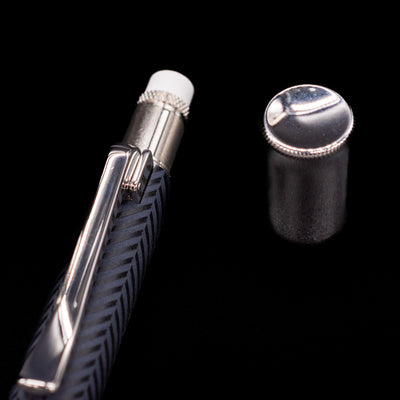 A close-up shot of the cap on the eraser for the Graf von Faber-Castell Guilloche Mechanical Pencil - Cisele Anthracite.