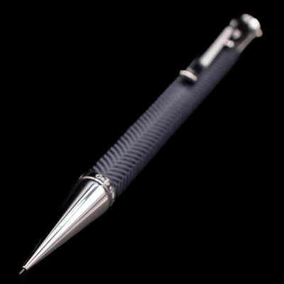 A full view of the Graf von Faber-Castell Guilloche Mechanical Pencil - Cisele Anthracite with a focus on its tip.