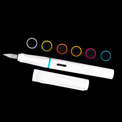 Full view of the uncapped LAMY Safari Multi Fountain Pen in glossy, displaying its lightweight white barrel and comfortable triangular grip with the six colorful rings.