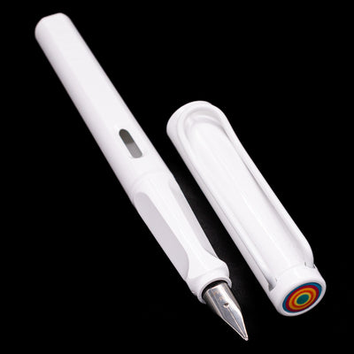 Full view of the uncapped LAMY Safari Multi Fountain Pen in glossy white, displaying its lightweight white barrel and comfortable triangular grip.