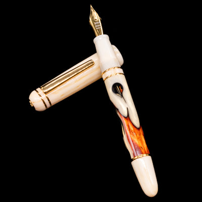 Laban 326 Fountain Pen - Desert Mirage laying on top of its cap in a crossed position showing full view of the entire uncapped pen.