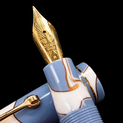 A macro shot of the nib with its intricate detailing and logo engraving for the Leonardo Momento Zero Lavanda Gold Trim Fountain Pen - Preowned.