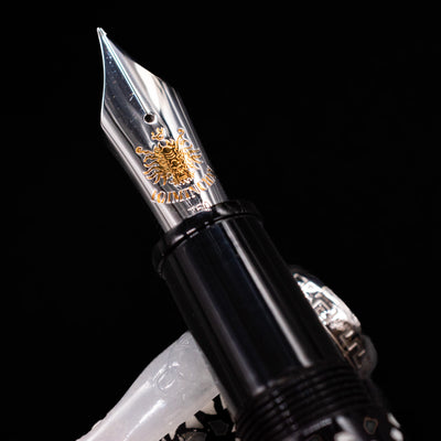 A macro shot of the nib with its intricate detailing and logo engraving for the Loiminchay Snow with Jade Clip Fountain Pen.