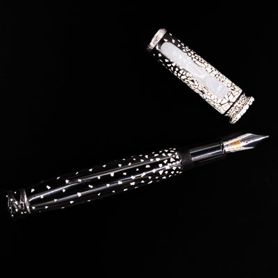 An overhead view of the Loiminchay Snow with Jade Clip Fountain Pen uncapped.