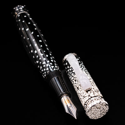 A full view of the Loiminchay Snow with Jade Clip Fountain Pen uncapped, with its cap laying next to the pen. 