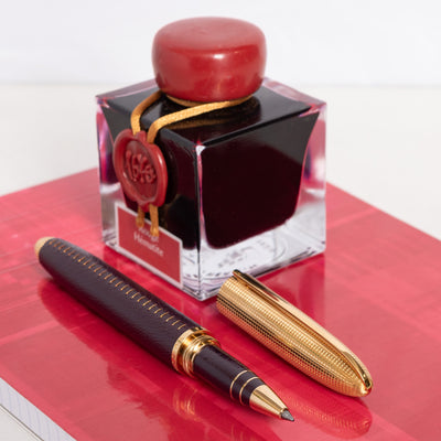 Louis Vuitton Doc Burgundy Leather & Gold Rollerball Pen stitched
