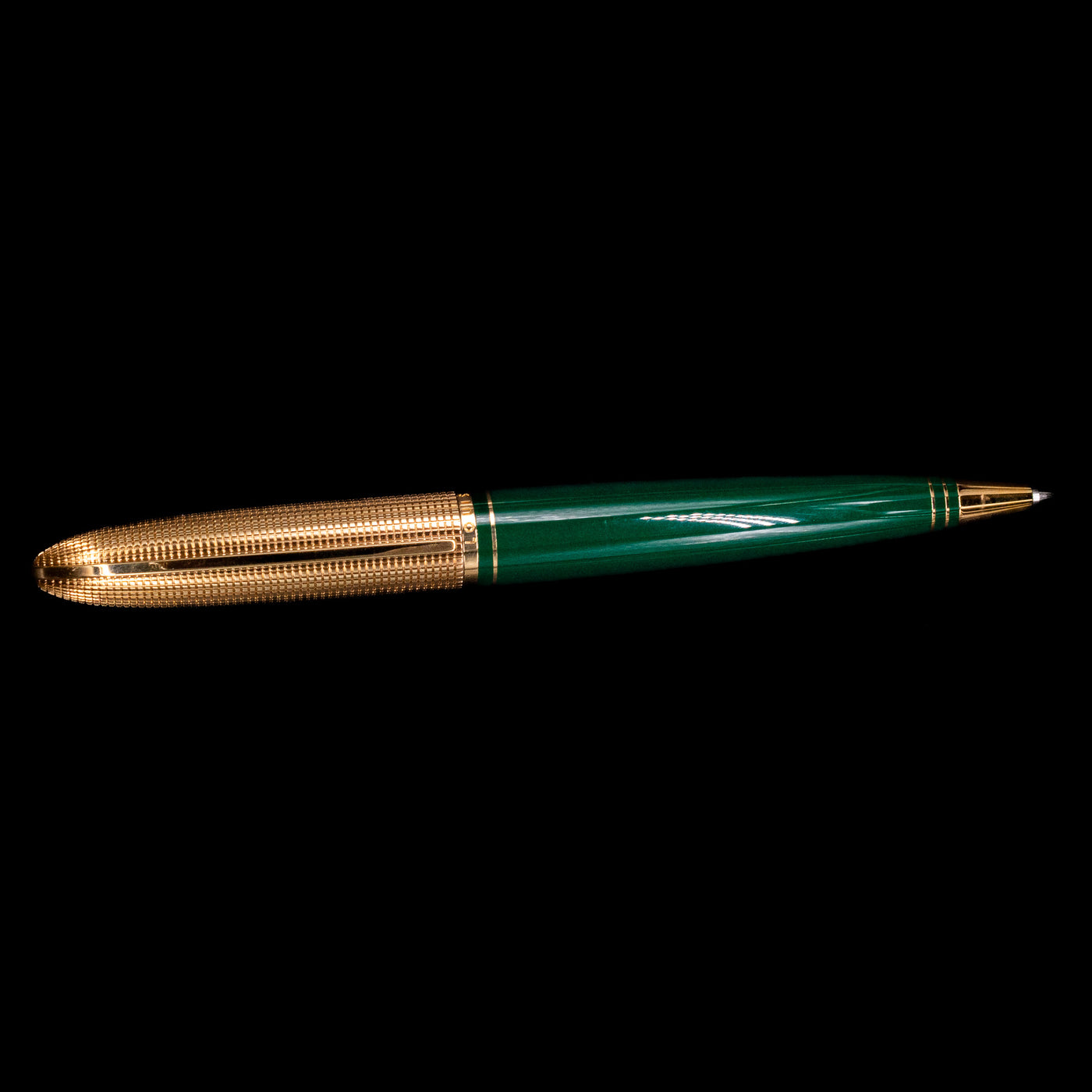 An overhead view of the Louis Vuitton Doc Lacquer Green & Gold Ballpoint Pen - Preowned.