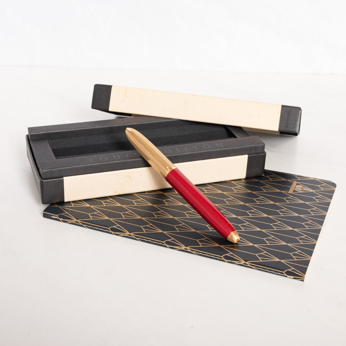 Louis Vuitton Doc Red Lacquer & Gold Rollerball Pen capped