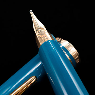 A macro shot of the nib with its intricate detailing and logo engraving for the Montblanc Generation Turquoise Fountain Pen - Preowned.