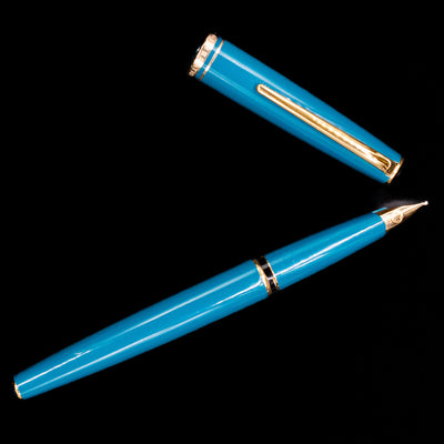An overhead view of the Montblanc Generation Turquoise Fountain Pen - Preowned uncapped.