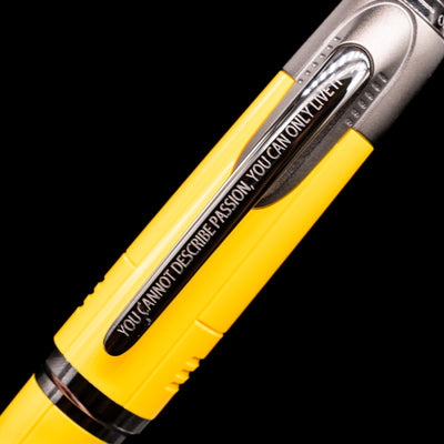 A detail shot of the cap and clip of the Montblanc Great Characters Enzo Ferrari Fountain Pen - Giallo Modena.