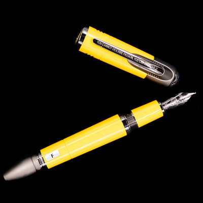 An overhead view of the Montblanc Great Characters Enzo Ferrari Fountain Pen - Giallo Modena uncapped.