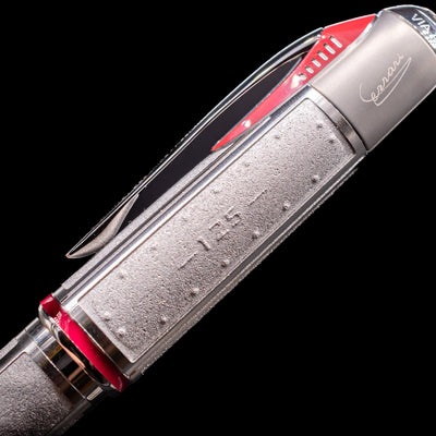 Close-up view of the side of the cap on the Montblanc Great Characters Enzo Ferrari Limited Edition 1898 Rollerball Pen - Preowned showcasing its intricate metal detailings.