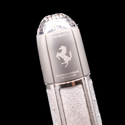 A macro shot of the Ferrari horse logo on the back of the cap of the Montblanc Great Characters Enzo Ferrari Limited Edition 1898 Rollerball Pen - Preowned. 