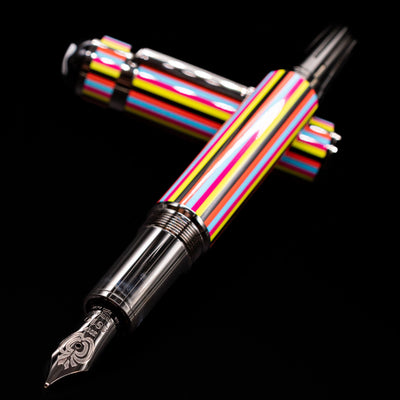 Montblanc Great Characters The Beatles Special Edition Fountain Pen - Preowned laying across its own cap, crossed, with a focus on the nib.