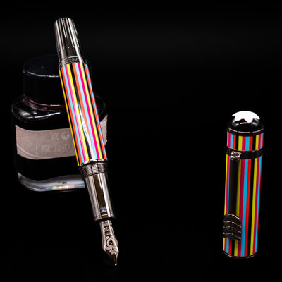 Montblanc Great Characters The Beatles Special Edition Fountain Pen - Preowned leaning on an ink bottle uncapped showcasing the detailing on the nib.