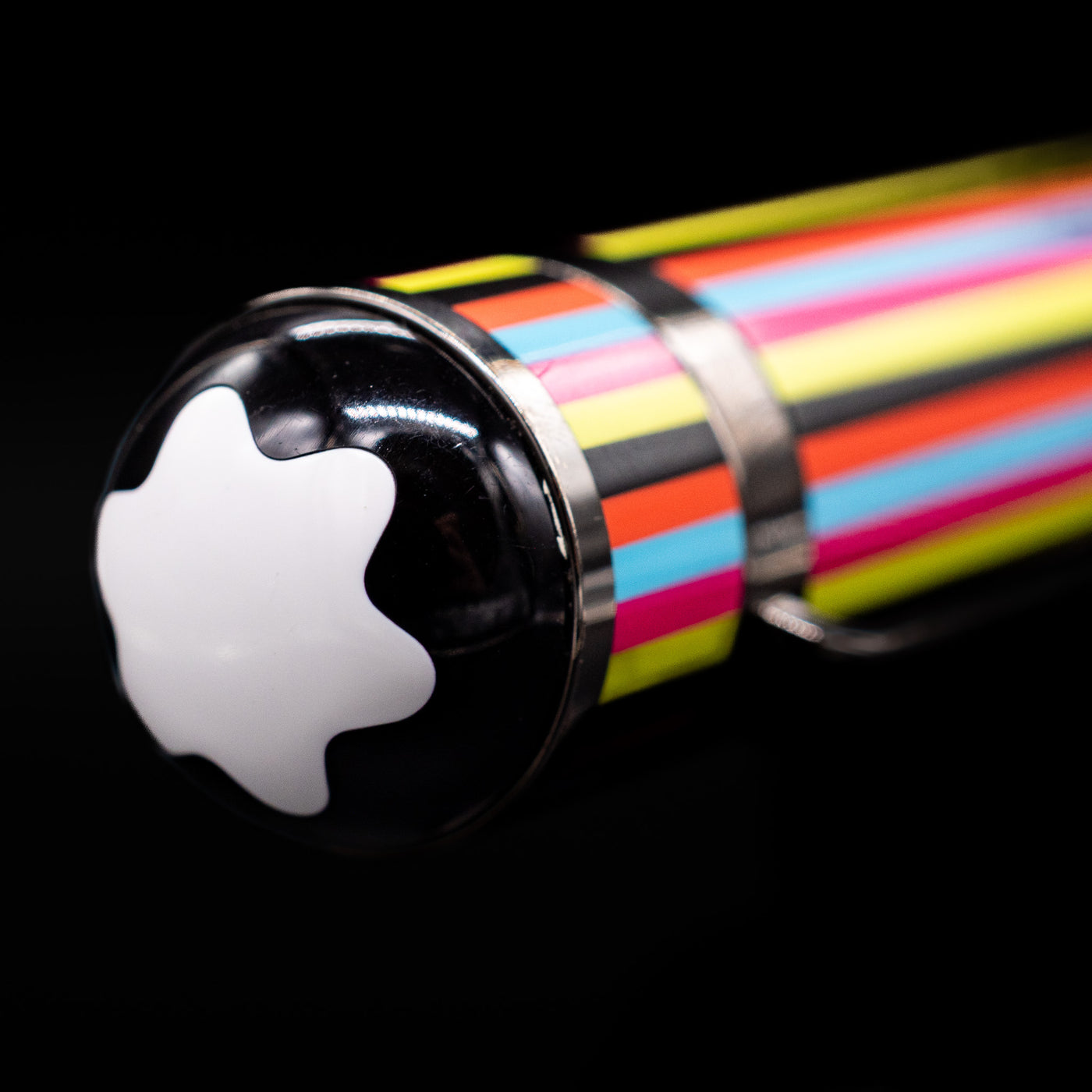 Zoomed-in view of the top of the cap with the finial on the Montblanc Great Characters The Beatles Special Edition Rollerball Pen - Preowned.