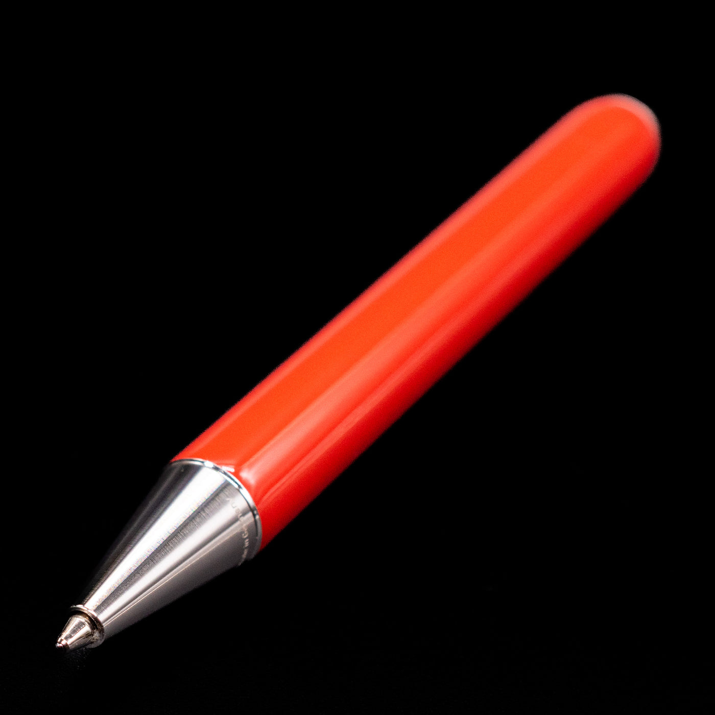 Montblanc Heritage Baby Ballpoint Pen - Coral shown in full view while focusing on the tip.