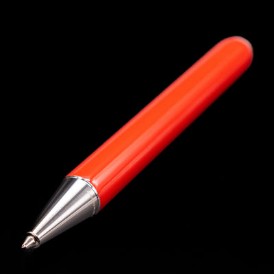 Montblanc Heritage Baby Ballpoint Pen - Coral shown in full view while focusing on the tip.