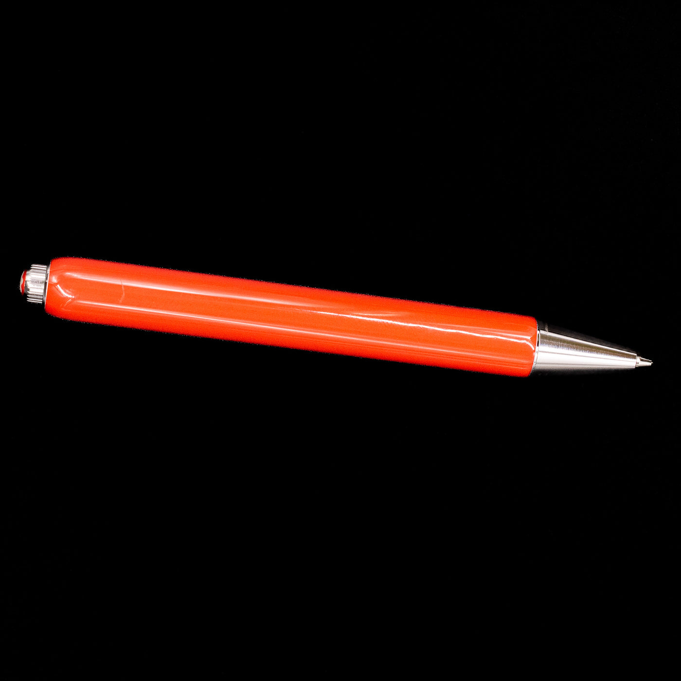 An overhead view of the Montblanc Heritage Baby Ballpoint Pen - Coral.