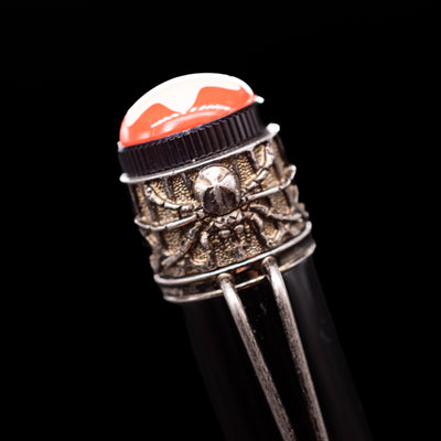 A close-up view of the spider on top of the body of the Montblanc Heritage Collection Metamorphosis Fountain Pen - Preowned.