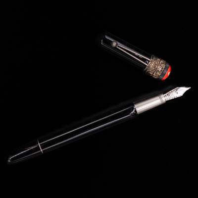 An overhead view of the Montblanc Heritage Collection Metamorphosis Fountain Pen - Preowned uncapped.