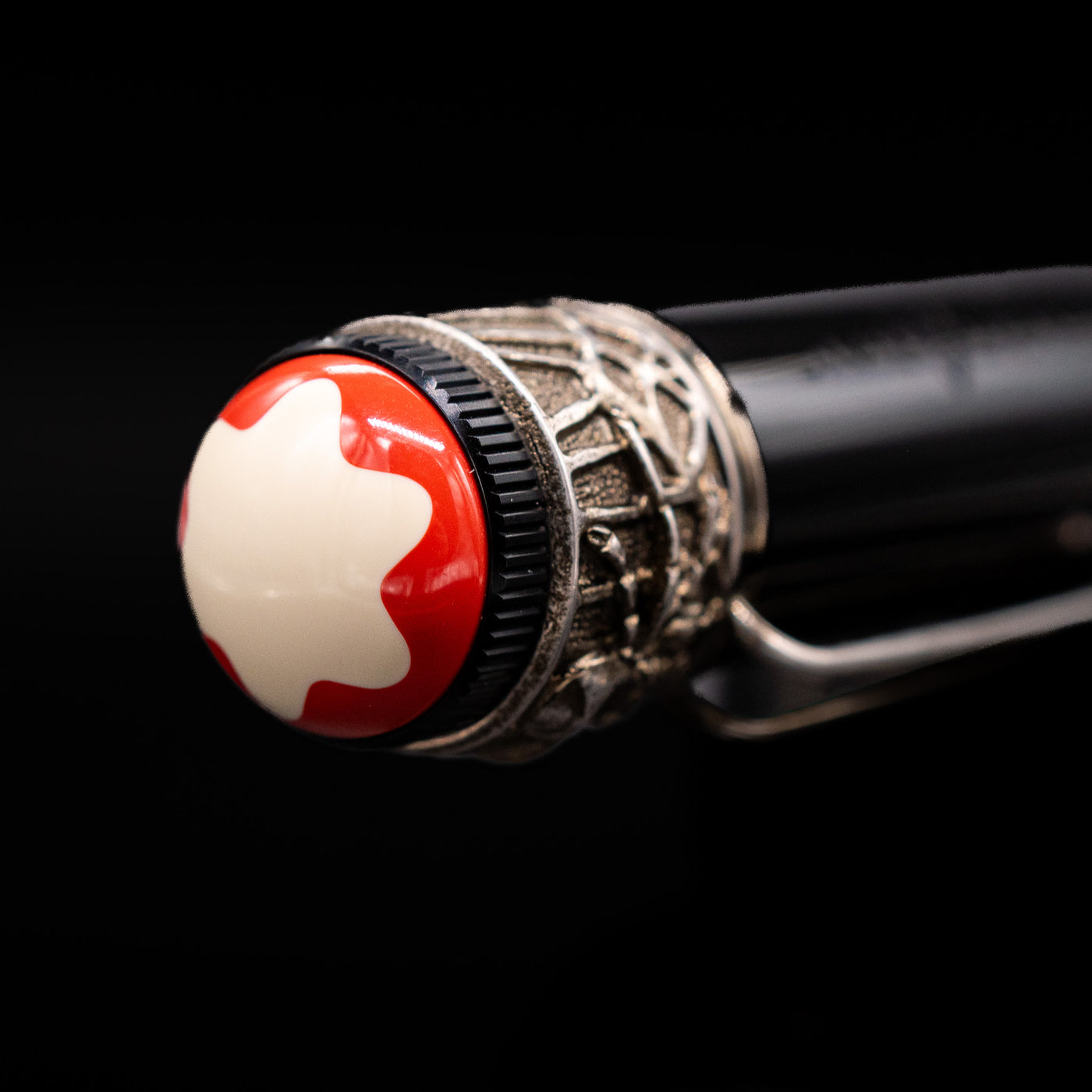 Zoomed-in view of the top of the cap with the finial on the Montblanc Heritage Collection Metamorphosis Rollerball Pen - Preowned.