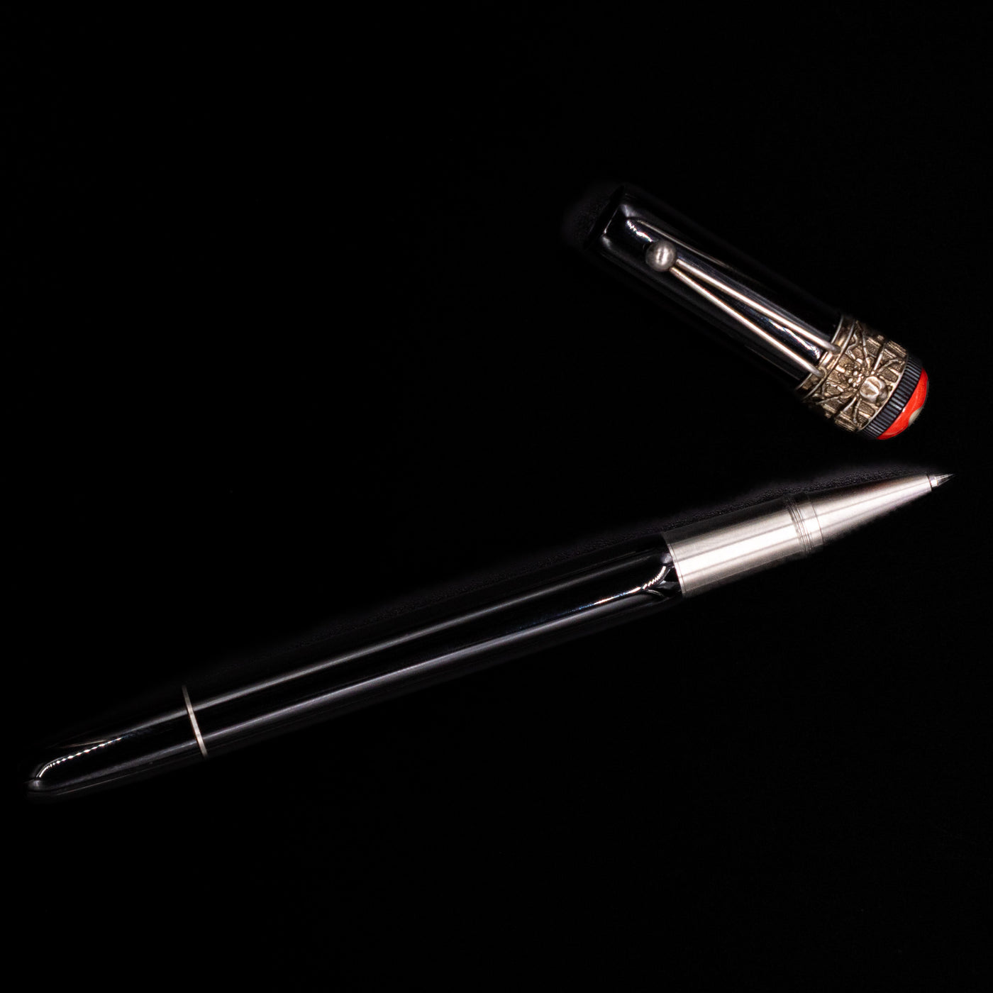 An overhead view of the Montblanc Heritage Collection Metamorphosis Rollerball Pen - Preowned uncapped.