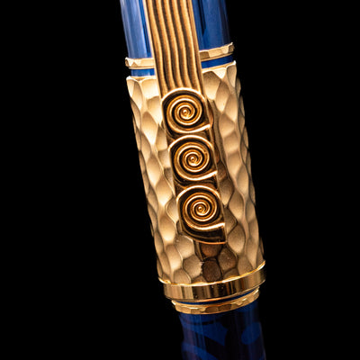 Close-up view of the detailing on the clip of the Montblanc Masters of Art Homage to Gustav Klimt Limited Edition 4810 Rollerball Pen - Preowned.