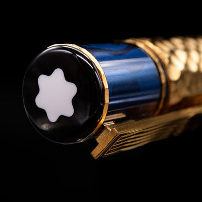 Zoomed-in view of the top of the cap with the finial on the Montblanc Masters of Art Homage to Gustav Klimt Limited Edition 4810 Rollerball Pen - Preowned.