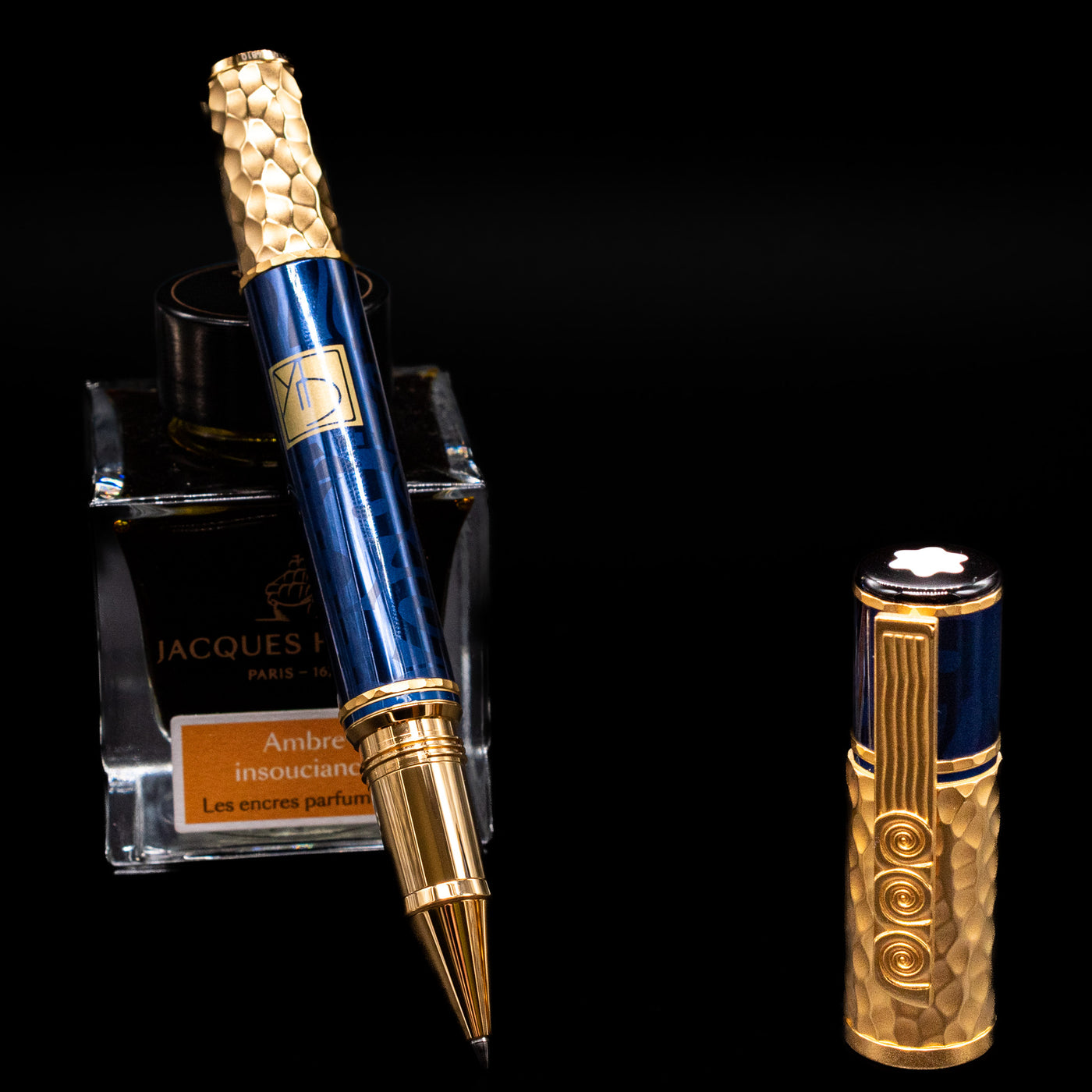 Montblanc Masters of Art Homage to Gustav Klimt Limited Edition 4810 Rollerball Pen - Preowned leaning on an ink bottle uncapped.