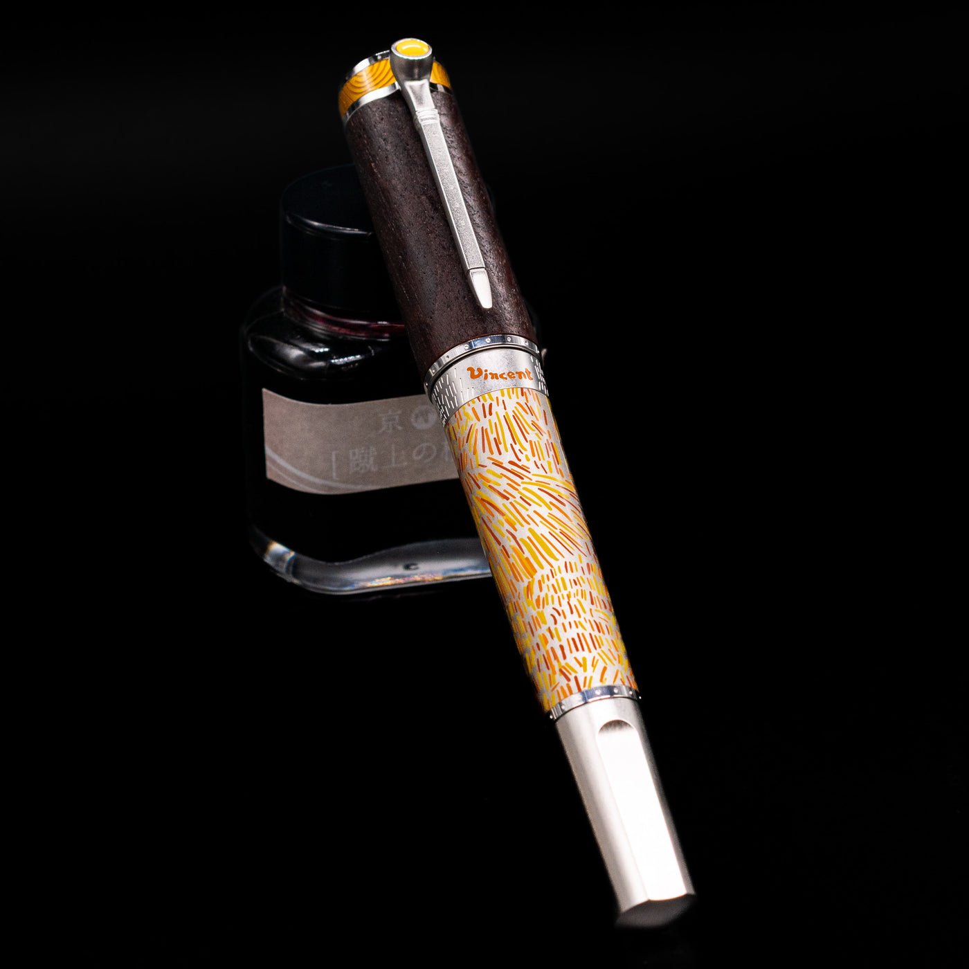 Montblanc Masters of Art Homage to Vincent Van Gogh Limited Edition 4810 Rollerball Pen - Preowned capped, leaning against an ink bottle. 
