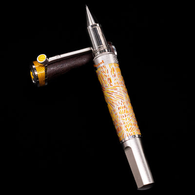 Montblanc Masters of Art Homage to Vincent Van Gogh Limited Edition 4810 Rollerball Pen - Preowned laying on top of its cap in a crossed position showing full view of the entire uncapped pen.